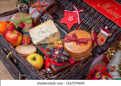 Christmas Food Hamper.
Wicker Hamper Loaded With Christmas Treats And Fruits