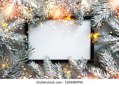 Christmas frame background with xmas tree. Merry christmas greeting card, banner. Winter holiday theme. Happy New Year. Space for text. Flat lay
