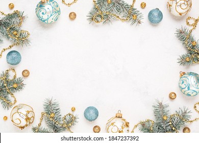 Christmas Frame On White, Holiday Background. Gold And Blue Christmas Decorations Border. White Background As Copy Space. 