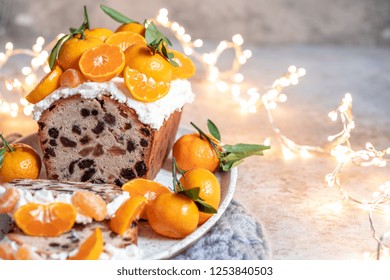 Christmas Fruit Cake Decorated With A Clementines