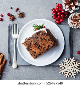 Christmas Fruit Cake, Pudding On White Plate. Copy Space. Top View.