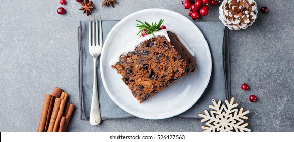 Christmas Fruit Cake, Pudding On White Plate. Copy Space. Top View.