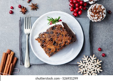 Christmas Fruit Cake, Pudding On White Plate. Copy Space. Top View.
