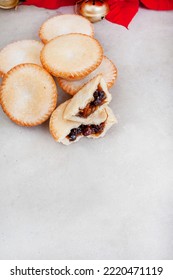 Christmas Fruit Mince Pies On Gray Surface With Lots Of Copy Space