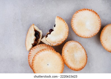 Christmas Fruit Mince Pies On Gray Surface With Lots Of Copy Space