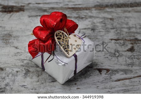 Similar – Image, Stock Photo White gift box with label on wooden table.