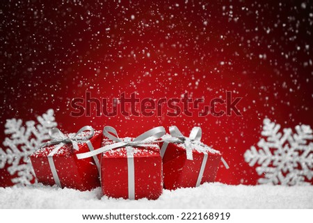  Christmas gift box on snow.