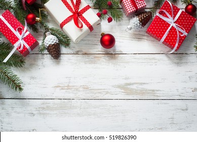 Christmas Gift Box.  Christmas Presents In Red Boxes At White Wooden Table. Flat Lay With Copy Space.