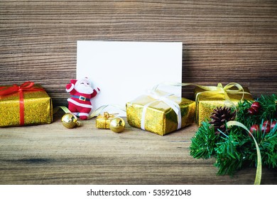 Christmas gift boxes on wooden table with place for copy space - Powered by Shutterstock