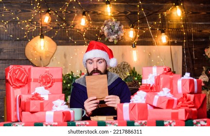 christmas gift delivery. bearded santa deliver gifts by address. Christmas shopping. bearded man santa. Greetings to relatives. happy new year. Xmas presents. winter shopping sales. Writing wish list - Shutterstock ID 2217886311