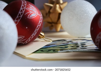 Christmas Gift With Ornaments, And Money Envelope. 