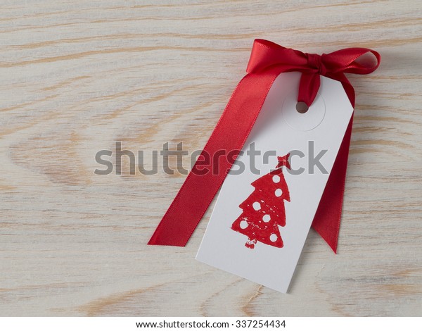 Christmas Gift Tag Printed Red Ribbon Stock Photo (Edit Now) 337254434