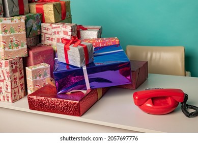 Christmas Gifts Lie On The Table In Modern Santa's Office