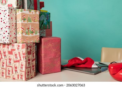 Christmas Gifts Lie On The Table In Modern Santa's Office