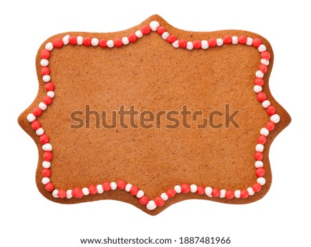 Christmas gingerbread cookie in shape of label isolated over white background