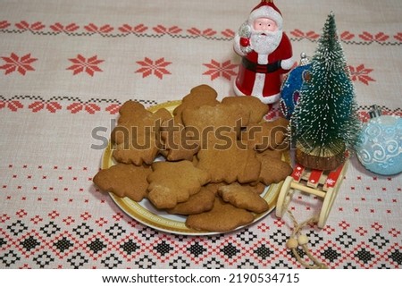 Christmas gingerbread cookies,Christmas gingerbread with Santa and sleigh and Christmas tree on the table