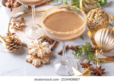 Christmas Gingerbread martini cocktail, spicy winter alcohol cocktail with gingerbread syrup, on New Year Xmas decorated background  - Powered by Shutterstock