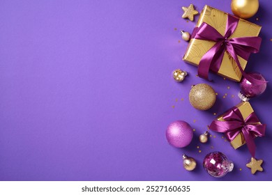 Christmas gold pattern gift boxes with purple ribbons, golden and violet purple and ball decorations, confetti on purple background. Flat lay, top view, copy space