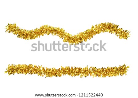 Christmas gold tinsel for decoration. White isolate