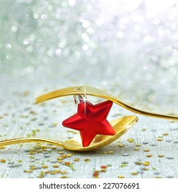 Christmas golden cutlery and on festive background
