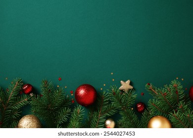 Christmas green background with red and gold baubles, pine branches, and stars. Xmas greeting card design, New Year banner template.