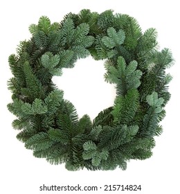 Christmas Green Spruce Wreath Over White Background.