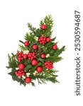 Christmas greenery festive flora and bauble decoration with holly, ivy, mistletoe, pine cones, cedar fir and red bulb balls. Traditional arrangement for the holiday season.