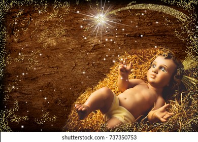Christmas greeting card, Baby Jesus vintage figurine on old wooden table and golden star
