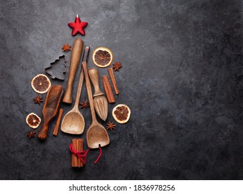 Christmas greeting card with kitchen utensils and ingredients. Top view flat lay with space for your xmas greetings or holiday recipe
