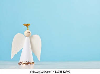 Christmas greeting card mock up with paper angel and christmas tree and decoration. - Powered by Shutterstock