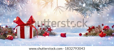 Christmas Holiday Background With Gift And Decorations On A Sunny Background