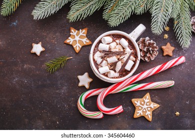 Christmas Holiday Background With Homemade Gingerbread Cookies And Hot Chocolate And Candy Canes. View From Above