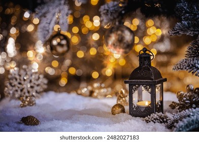 Christmas Holiday background with snow, fir tree and decorations with christmas light behind