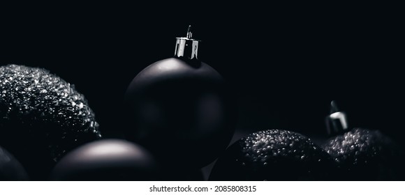 Christmas holiday and festive decoration concept. Black baubles as minimalistic xmas background. - Powered by Shutterstock