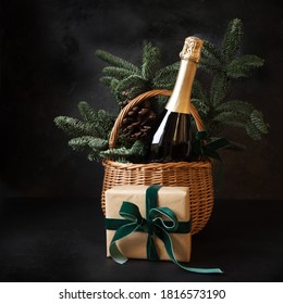 Christmas Holiday Gift Hamper With Sparkling Wine And Gift On Black.