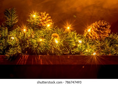 Christmas Holiday Lighting And Decorations On A Fireplace Mantle.