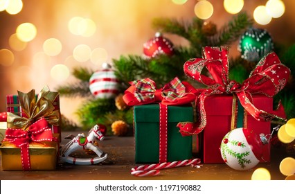 Christmas holidays composition with  gift boxes on wooden background