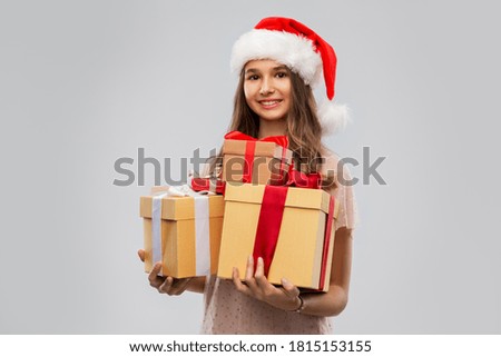 Similar – Image, Stock Photo Many hats of Santa on a rustic wooden table