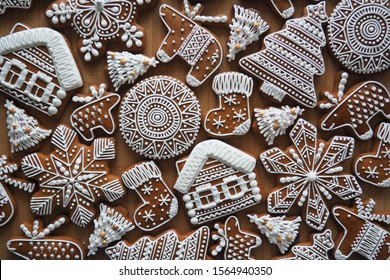 Christmas homemade gingerbread cookies on wooden background. happy New Year. Homemade delicious Flat lay, chritmas festive background. food background. top view. Xmas creative Greeting Card