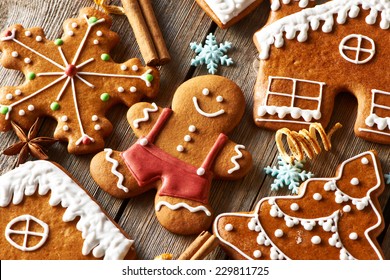 Christmas homemade gingerbread cookies on wooden table