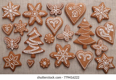 Christmas homemade gingerbread cookies on linen canvas.