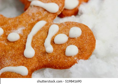 Christmas Homemade Gingerbread On Snow.Closeup.candyman.funny Cookies