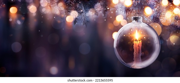 Christmas Hope - Candle With Bright Flame In Ball Hanging Tree With Defocused Lights On Background - Prayer And Advent Concept - Powered by Shutterstock