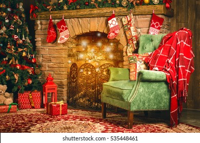 Christmas Interior Room Fireplace, Christmas Tree, Green Chair With A Red Blanket And Gifts