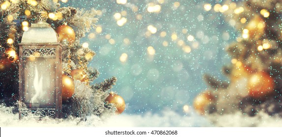 Christmas lantern with Christmas decoration on the snow - Powered by Shutterstock