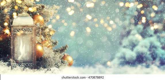 Christmas lantern with Christmas decoration on the snow - Powered by Shutterstock