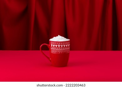 Christmas Latte In A Red Mug On A Red Background