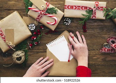 Christmas Letter Writing On Paper On Wooden Background With Decorations