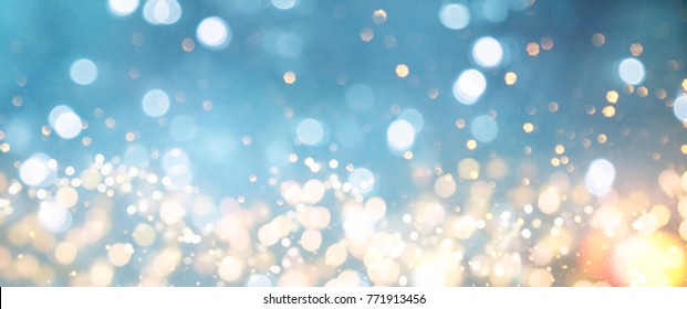 Christmas light background.  Holiday glowing backdrop. Defocused Background With Blinking Stars. Blurred Bokeh. - Shutterstock ID 771913456