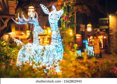 Christmas Light Of Some Light Deers In Gatlinburg In A Snowy Day With Some Warm Lights